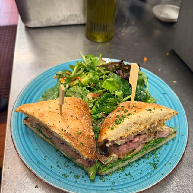 Flat Iron Steak and Arugula Sandwich.